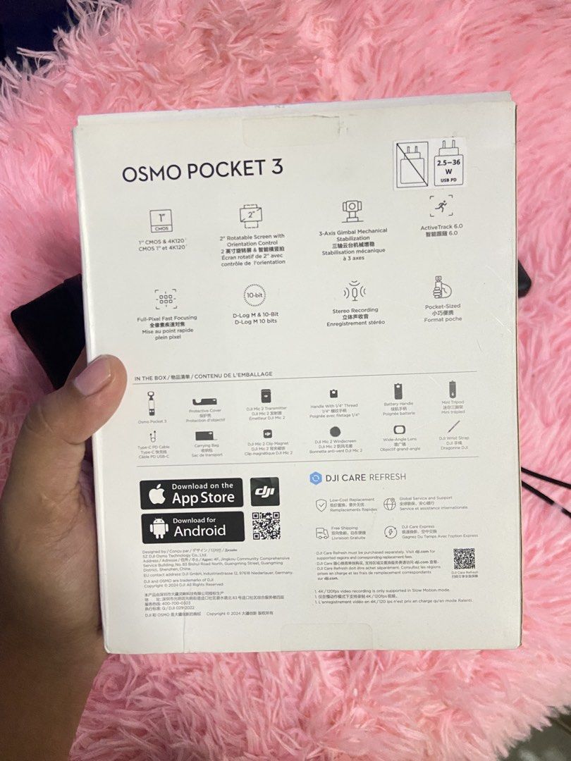 DJI Osmo Pocket 3 Creator Combo (Category: Cameras) located in Manila. Submitted by joyceeyyyy (Listing ID 1470957343, Image 3). Description: - Includes handheld gimbal camera and battery handle for extended shooting - DJI Mic 2 transmitter with furry windscreen and clip magnet for pro audio - Wide-angle lens and mini tripod included for versatile framing - Comes with original carrying bag, cables, power adapters, and retail box - Perfect all-in-