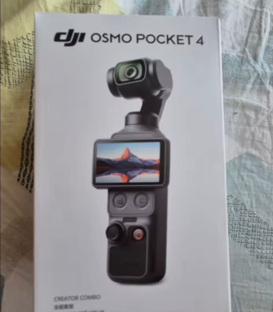 DJI Pocket4 (Category: Video Cameras) located in Caloocan City. Submitted by marybathan567_earth (Listing ID 1471118359, Image 2). Description: DJI Pocket4 | 1 Inch CMOS | 4K 240fps | 10bit DLog M | 3 Axis Gimbal | 107GB Storage.