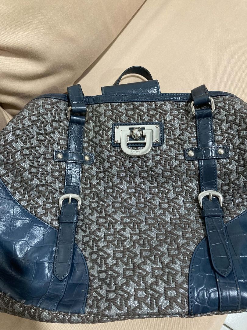 DKNY Logo Monogram Shoulder Bag with Blue Croc Trim (Category: Shoulder Bags) located in Manila. Submitted by faireeph (Listing ID 1471054468, Image 2). Description: - Brand: DKNY - Style: Shoulder bag - Material: Brown monogram fabric with blue faux crocodile embossed leather trim - Hardware: Silver-tone with signature front lock detail and branded turn lock clasp - Closure: Zip top - Interior: Lined in black fabric with DKNY logo plaque pocket 