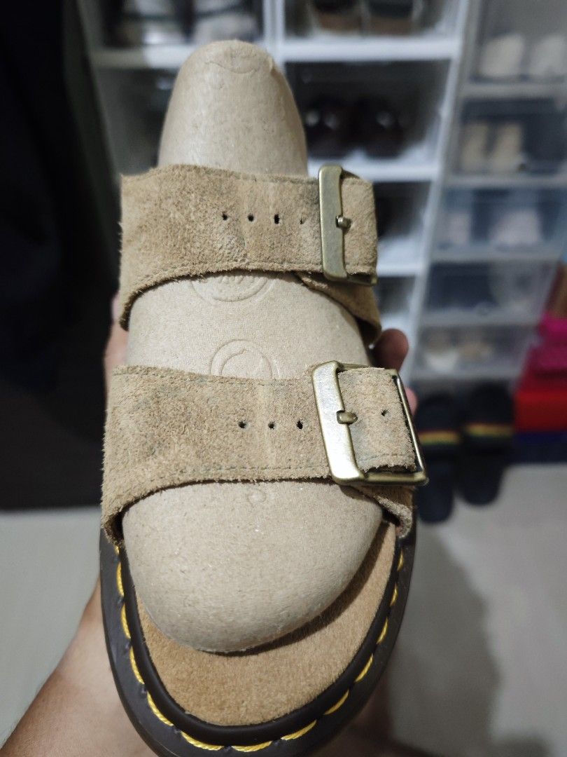 Dr. Martens Josef Suede Sandals (Category: Flats & Sandals) located in Manila. Submitted by fdrakearon89191 (Listing ID 1471043777, Image 1). Description: Dr. Martens Josef sandals in tan suede. Double buckle strap design with brass-tone hardware. Classic yellow stitching along the dark brown sole. Size UK 8, EU 42, US M 8. Made in Thailand. Minor wear on suede straps and footbeds. Soles have plenty of tread left..
