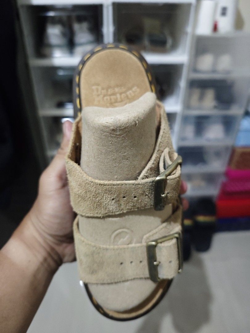 Dr. Martens Josef Suede Sandals (Category: Flats & Sandals) located in Manila. Submitted by fdrakearon89191 (Listing ID 1471043777, Image 2). Description: Dr. Martens Josef sandals in tan suede. Double buckle strap design with brass-tone hardware. Classic yellow stitching along the dark brown sole. Size UK 8, EU 42, US M 8. Made in Thailand. Minor wear on suede straps and footbeds. Soles have plenty of tread left..