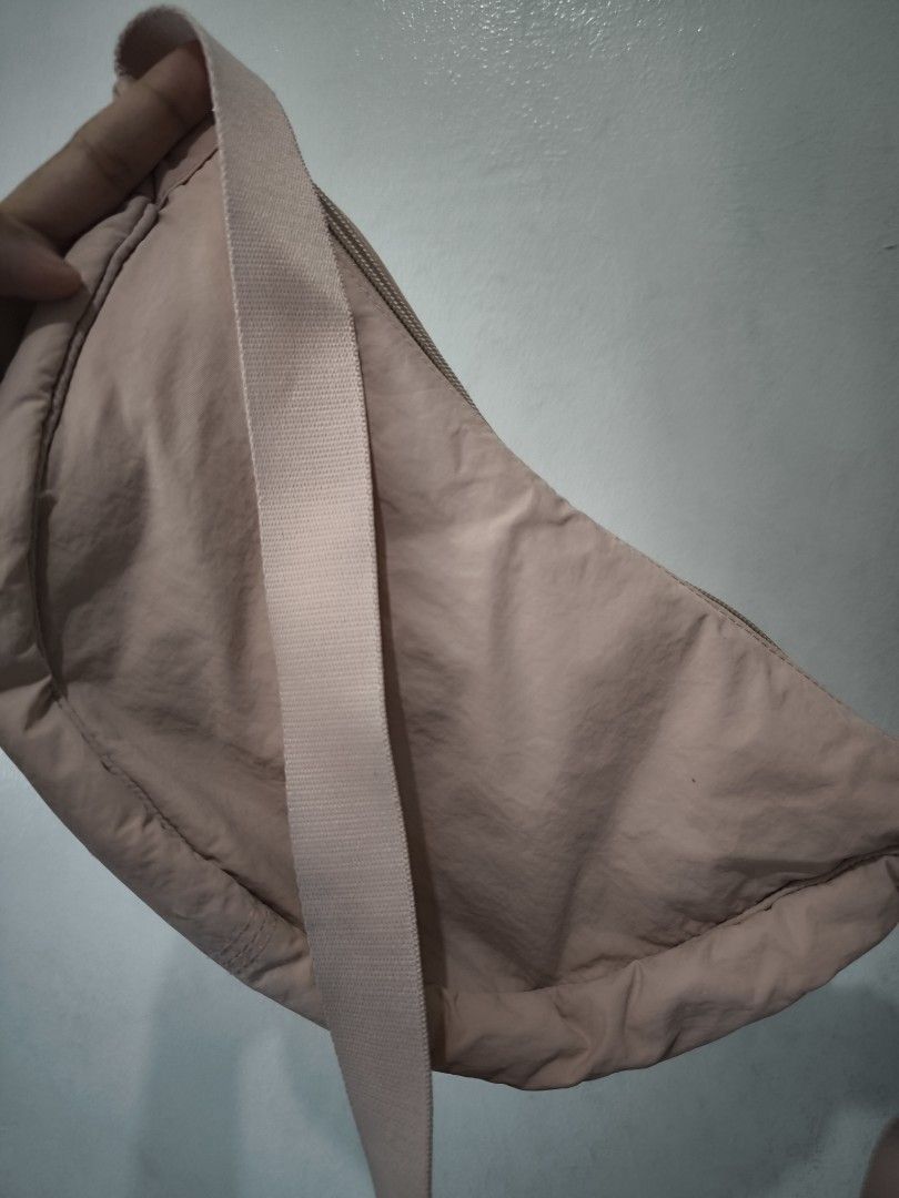 Dumpling bag (buy 1 take 1) (Category: Shoulder Bags) located in Taytay. Submitted by misspol (Listing ID 1470970104, Image 2). Description: - Made of lightweight, puffy quilted nylon fabric - Secure top zipper closure - Adjustable strap with slider buckle for a custom fit - Foldable and packable design for easy travel - Ideal lightweight everyday carryall declutering, 2 items for 300php.