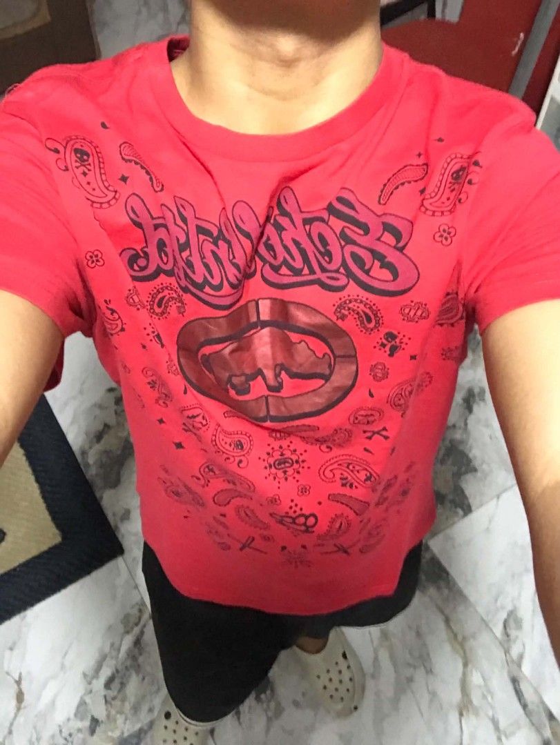 Ecko Unltd Red T-Shirt Size S (Category: Tshirts & Polo Shirts ) located in Manila. Submitted by mikeee03 (Listing ID 1471072036, Image 1). Description: - Brand: Ecko Unltd - Size: Small (S) - Design: Bold front logo with bandana graphic print - Fit/Material: Soft cotton, comfortable regular fit - Style: Short sleeves, crew neck, casual wear - Condition: Good - Ready to wear.