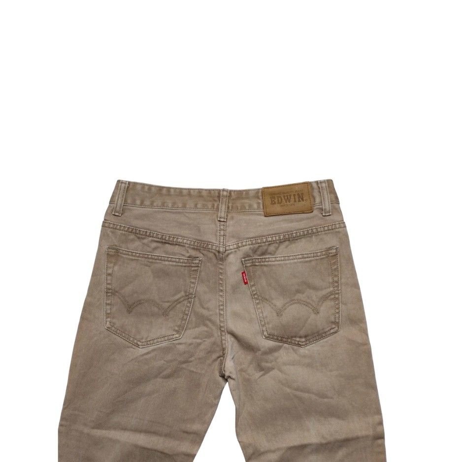 EDWIN Khaki Denim Jeans (Category: Jeans) located in Meycauayan. Submitted by thrifting_gorilla (Listing ID 1471109174, Image 3). Description: EDWIN Khaki Denim Jeans - Brand: EDWIN - Color: Brown - Fit: Straight leg cut - Design: Classic five-pocket layout with leather patch on back waistband and branded buttons - Condition/Material: Sturdy fabric, ideal for everyday casual wear.