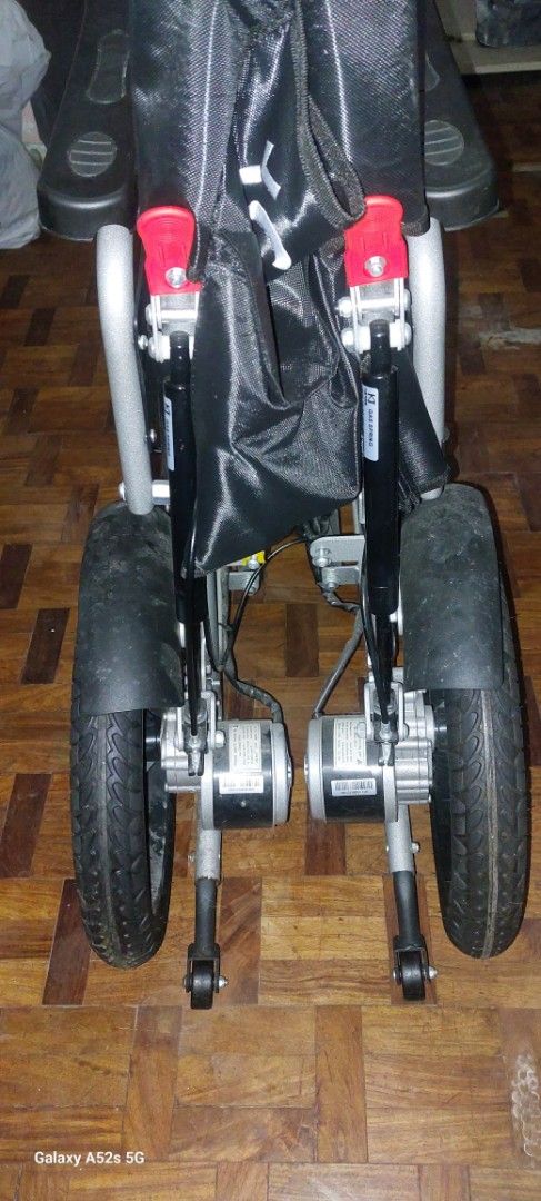 ELECTRIC WHEEL CHAIR iCare E510 (Category: Wheelchairs) located in Las Pinas. Submitted by purecloud_696d26 (Listing ID 1471059176, Image 1). Description: - Brand: iCare - Type: Foldable wheelchair for easy storage and transport - Frame: Durable silver metal frame - Seating: Comfortable black fabric seat and backrest - Wheels: Large rear wheels with fenders and shock-absorbing front casters - Comfort & Support: Built-in gas springs and sturdy arm