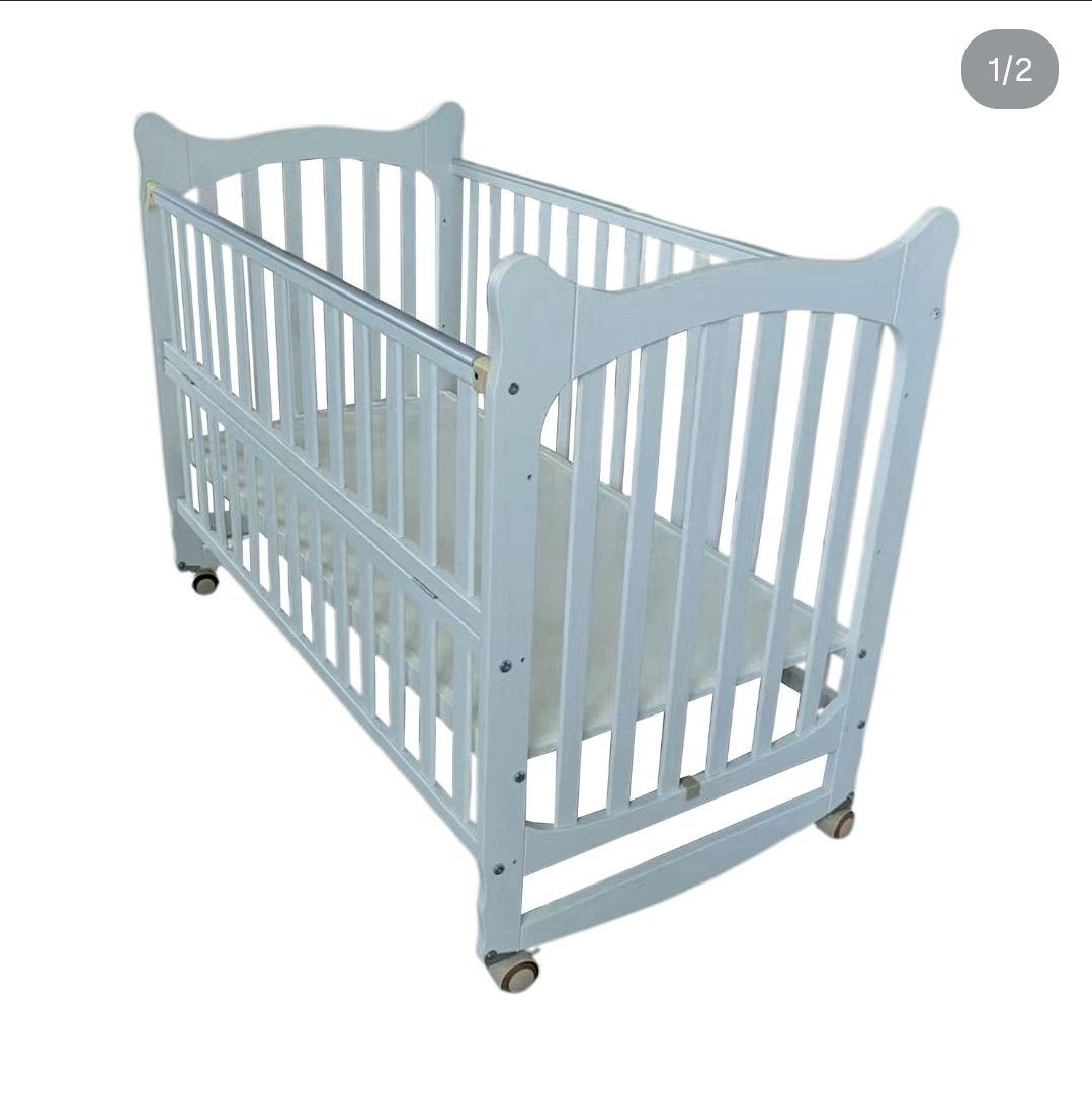 Ella Convertible Crib with Matress (Category: Cots & Cribs) located in Pasig City. Submitted by momofwillow (Listing ID 1471013244, Image 2). Description: 🔄 Multi-functional 4-in-1 Configurations The crib transitions seamlessly across four distinct stages: 1. Infant Crib: A fully enclosed secure sleeping area for newborns and infants. 2. Co-Sleeper / Bedside Sidecar: Side rail drops down to securely align right against the parents' bed. 3. Rocke
