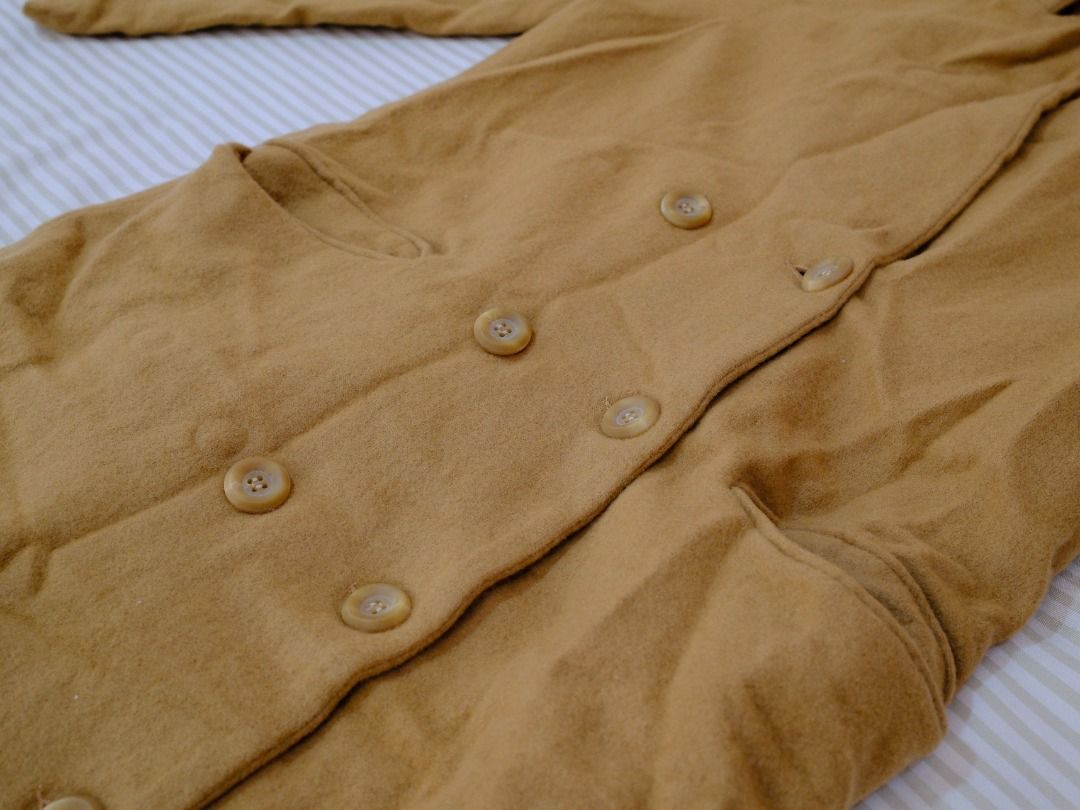 Elysia Dress Mustard Long Coat Jacket (Category: Coats, Jackets and Outerwear) located in Obando. Submitted by chokbotsss (Listing ID 1471011266, Image 2). Description: Pre-Loved Clothes - Price: 300 - Brand: Elysia Dress - Color: Mustar/Brown - Size: N/A - Issue: None Notes: Perfect for Autumn or Spring travel Payment: Gcash/Bank Transfer Delivery: Lalamove/LBC Location: Maysilo, Malabon City.