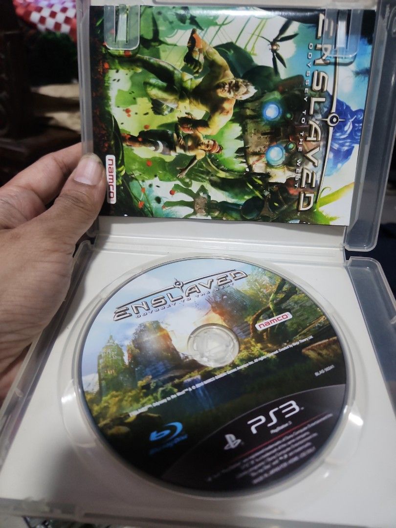 Enslaved Odyssey to the West PS3 Game (Category: PlayStation) located in Quezon City. Submitted by gwift (Listing ID 1471099951, Image 2). Description: - Title: Enslaved: Odyssey to the West - Platform: PlayStation 3 (PS3) - Developer: Ninja Theory - Publisher: Namco Bandai - Genre: Action-Adventure - Condition: Case has normal shelf wear; disc plays great - Inclusions: Original case and game disc rare/uncommon games price based on gameye app or 
