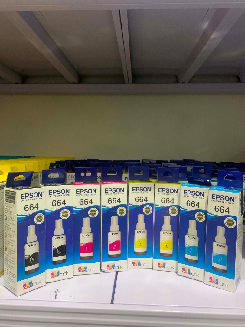 Epson 664 EcoTank Ink Set CMYK (Category: Printers, Scanners & Copiers) located in Quezon City. Submitted by inksource123 (Listing ID 1470953459, Image 2). Description: - Product: Full set of Epson 664 EcoTank ink bottles (Black, Cyan, Yellow, Magenta) - Condition: 100% brand new, unopened boxes - Storage: Properly stored on shelf, guaranteed fresh and high quality - Compatibility: Standard capacity refill bottles for compatible Epson printers - 