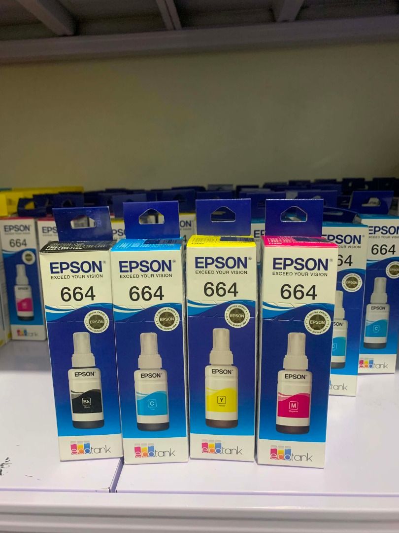 Epson 664 EcoTank Ink Set CMYK (Category: Printers, Scanners & Copiers) located in Quezon City. Submitted by inksource123 (Listing ID 1470953459, Image 1). Description: - Product: Full set of Epson 664 EcoTank ink bottles (Black, Cyan, Yellow, Magenta) - Condition: 100% brand new, unopened boxes - Storage: Properly stored on shelf, guaranteed fresh and high quality - Compatibility: Standard capacity refill bottles for compatible Epson printers - 