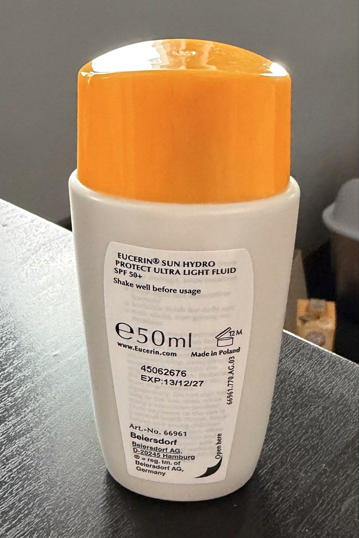 Eucerin Sun Hydro Protect Ultra Light Fluid SPF 50+ (Category: Face Care) located in Quezon City. Submitted by prettyme23 (Listing ID 1470978257, Image 2). Description: - Brand: Eucerin - Product: Sun Hydro Protect Ultra Light Fluid SPF 50+ - Volume: 50ml - Condition: Brand new, unopened (white body with orange cap) - Origin: Made in Poland by Beiersdorf - Expiry Date: 13/12/2027 - Art Number: 66961 - Directions: Shake well before use.