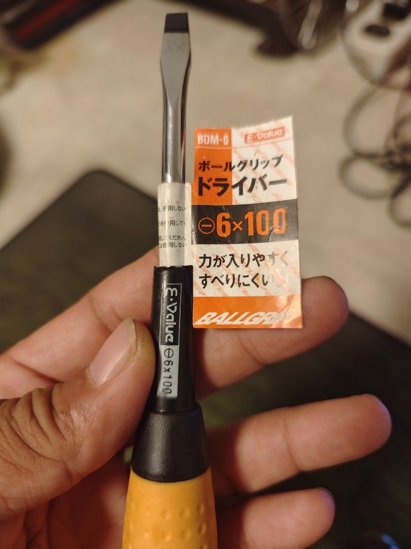 E-Value Ball Grip Screwdriver 6x100 Flathead BDM-6 (Category: Construction Tools & Equipment) located in Manila. Submitted by georgelmar99205 (Listing ID 1471069618, Image 2). Description: - Brand: E-Value - Type: Ball grip flathead screwdriver (6x100 tip) - Condition: Brand new and unused with original paper packaging tag - Design: Ergonomic yellow and black handle with textured grip for enhanced torque - Ideal for: DIY projects, woodworking, an