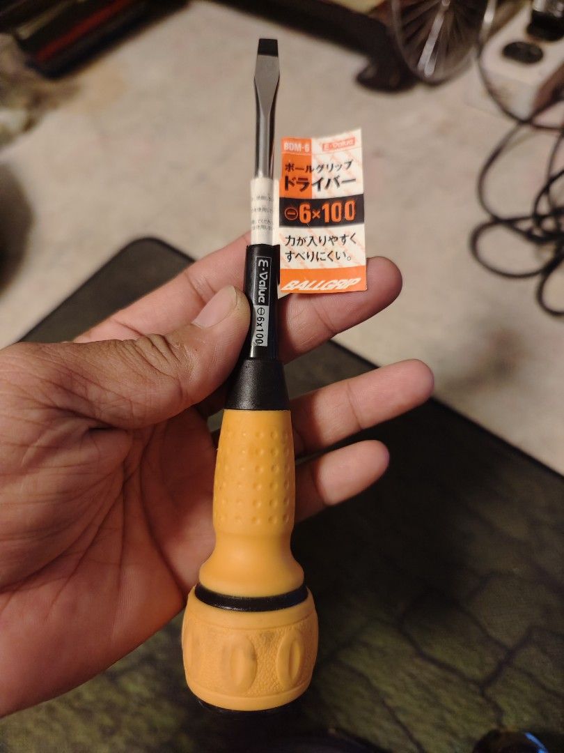 E-Value Ball Grip Screwdriver 6x100 Flathead BDM-6 (Category: Construction Tools & Equipment) located in Manila. Submitted by georgelmar99205 (Listing ID 1471069618, Image 1). Description: - Brand: E-Value - Type: Ball grip flathead screwdriver (6x100 tip) - Condition: Brand new and unused with original paper packaging tag - Design: Ergonomic yellow and black handle with textured grip for enhanced torque - Ideal for: DIY projects, woodworking, an