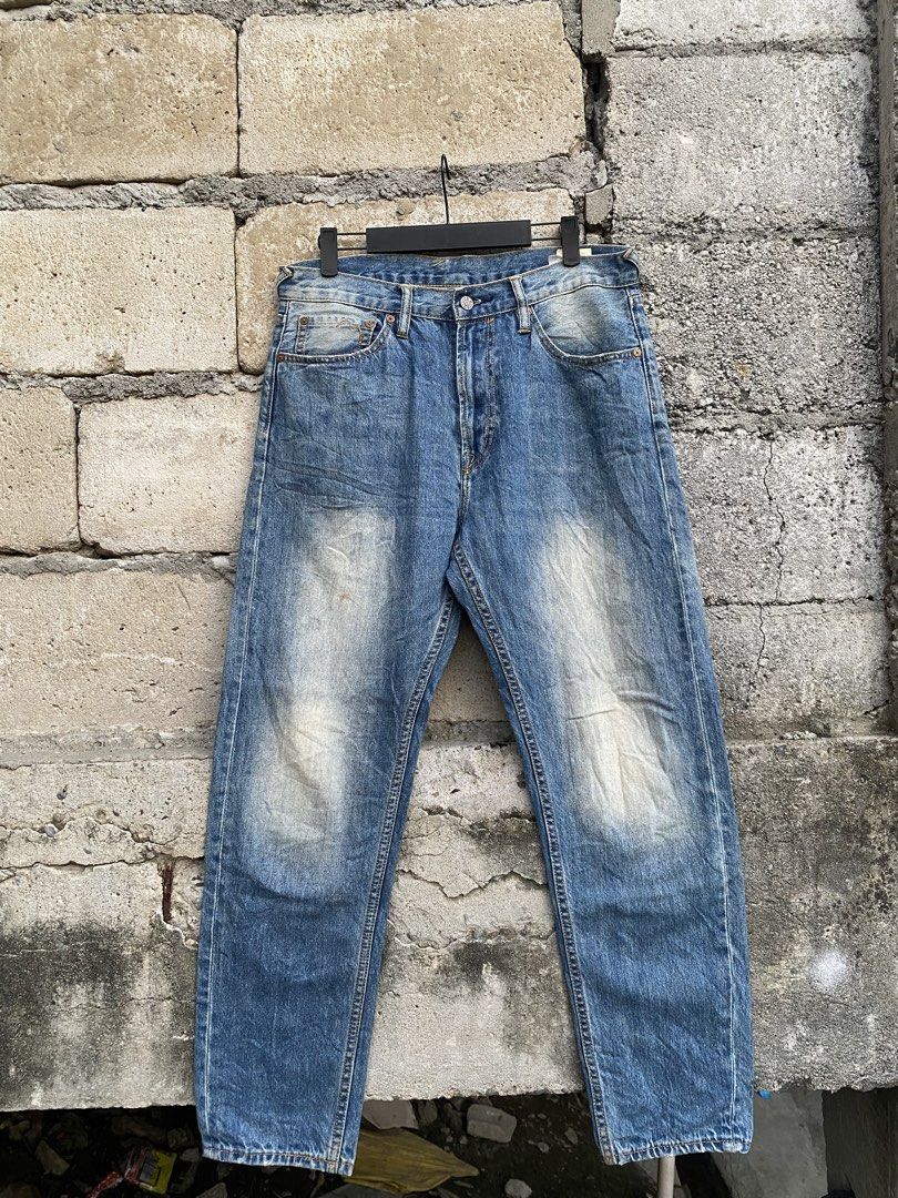 Evisu DAICOCK alternative Copy (Category: Jeans) located in Candaba. Submitted by dejesus.bench17 (Listing ID 1470932446, Image 2). Description: - Model: Lot 2008 denim jeans with a stylish heavy wash effect - Design Details: Eye-catching blue and red paisley print fabric panels running down the back legs - Branding: Signature yellow patterned seagull design across the rear yoke and stamped leather patch on the waistband - Classic Build: Traditio