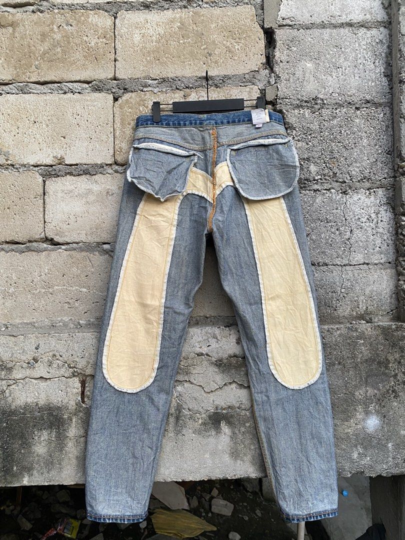 Evisu DAICOCK alternative Copy (Category: Jeans) located in Candaba. Submitted by dejesus.bench17 (Listing ID 1470932446, Image 3). Description: - Model: Lot 2008 denim jeans with a stylish heavy wash effect - Design Details: Eye-catching blue and red paisley print fabric panels running down the back legs - Branding: Signature yellow patterned seagull design across the rear yoke and stamped leather patch on the waistband - Classic Build: Traditio