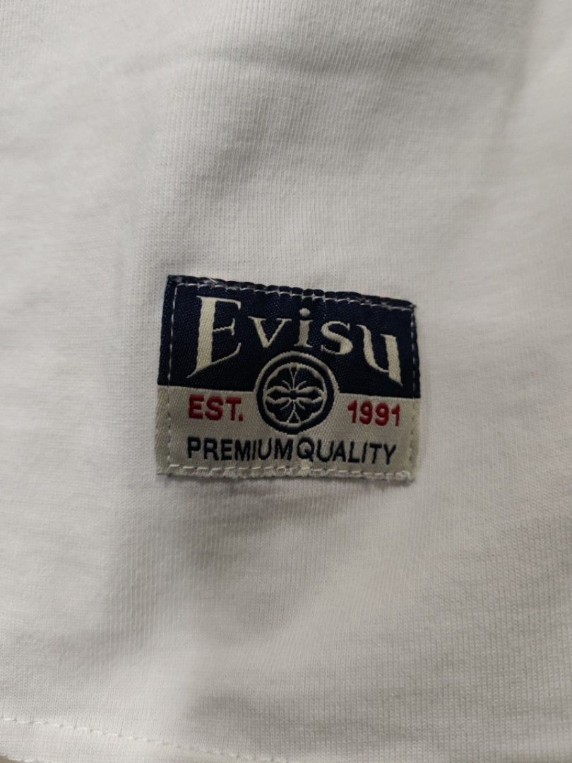 Evisu Multi-Pocket Design Shirt (Category: Tshirts & Polo Shirts ) located in Rosales. Submitted by kudoscache (Listing ID 1471078632, Image 3). Description: - Brand: Evisu - Waist: 21 | Length: 27 - Color: White - slightly nego payment: maribank / gotyme courier: J&T.