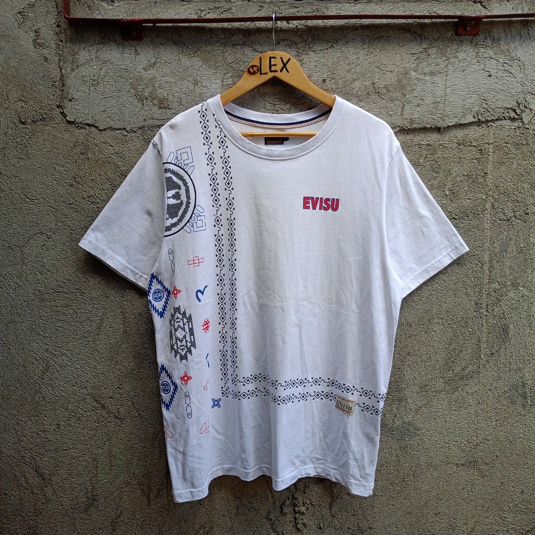 EVISU WHITE TEE (Category: Tshirts & Polo Shirts ) located in Koronadal. Submitted by thriflex.29 (Listing ID 1470946385, Image 1). Description: EVISU WHITE TEE Size: Large Measurements: Width 22.5 Length 29 Condition: 9.5/10 - Excellent To Asnew Colorate: 9.5/10 No Issue/flaws walang basag print Mine: 400.