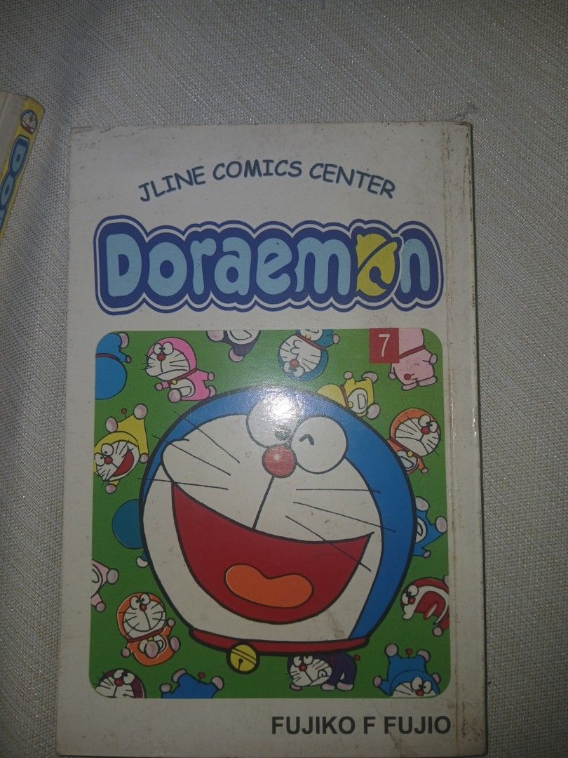 Fairy Tail Volume 60 and Doraemon Volume 6 & 7Manga (Bundle) (Category: Comics & Manga) located in Manila. Submitted by bluecurryc30065 (Listing ID 1471023703, Image 2). Description: - Manga bundle: Fairy Tail Vol. 60 (Hiro Mashima) and Doraemon Vol. 6 (Jline Comics Center edition) - Condition: Slight edge wear and page yellowing due to reading and storage - Selling as a set - Great for manga collectors and fans.
