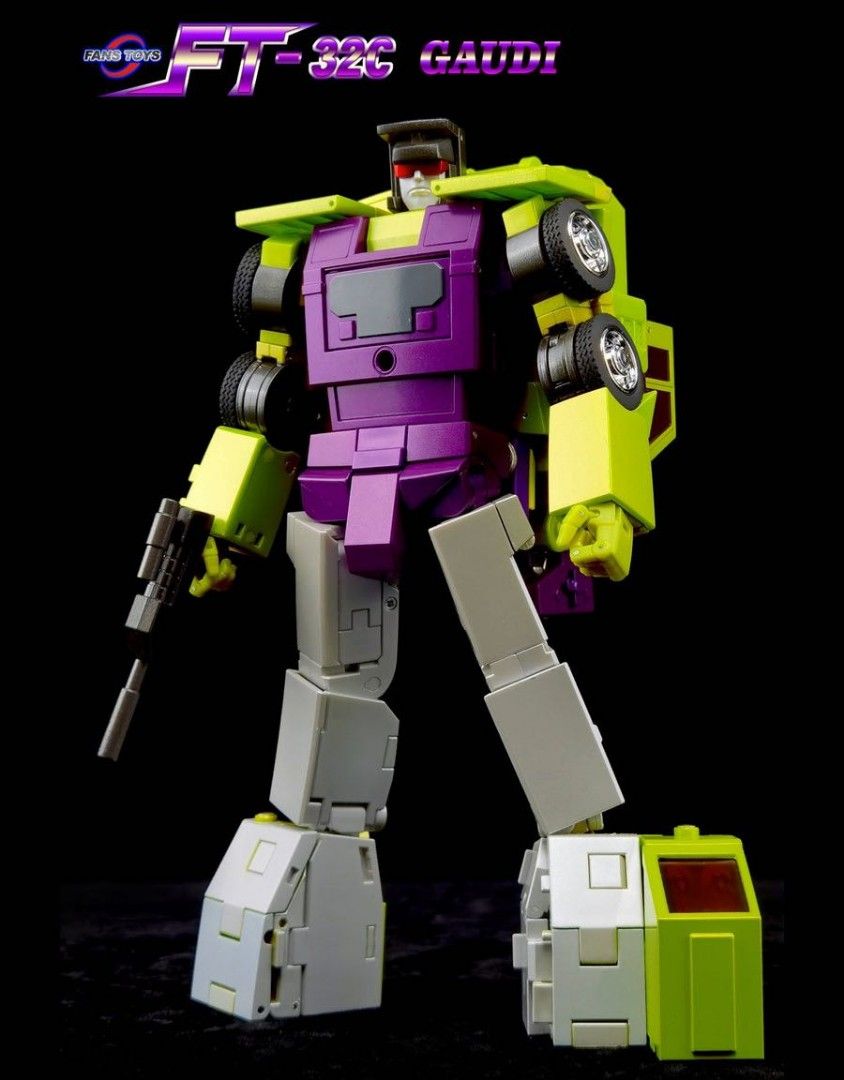Fans Toys FT-32C Gaudi Transformable Figure (Category: Figurines & Statues) located in Manila. Submitted by mauchan00000303 (Listing ID 1471000757, Image 2). Description: - Brand: Fans Toys (Model: FT-32C Gaudi) - Mode: Transforms between robot and yellow/purple crane truck - Scale: Masterpiece scale, ideal for collectors and displays - Features: Highly articulated design with included weapon accessory - Condition: 2026 release info on box, manuf