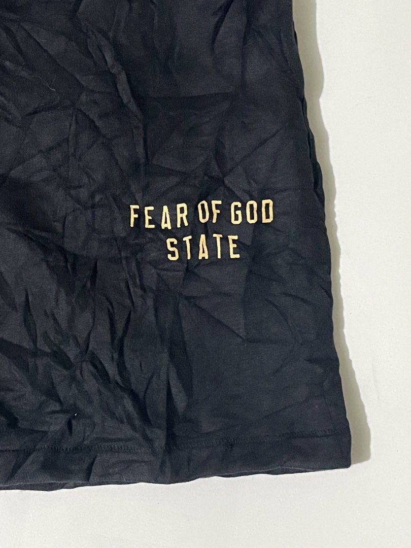 Fear of God Essentials Black State Shorts (Category: Shorts) located in Pilar. Submitted by fast-flip-ni-miko. (Listing ID 1471069015, Image 2). Description: - Brand: Fear of God Essentials - Color: Classic Black - Material: Premium cotton fleece for ultimate comfort - Waistband: Elastic with extra-long matching drawstrings - Branding: Rubberized Essentials label on front waistband & gold 'Fear of God State' print on left leg - Authenticity: Incl