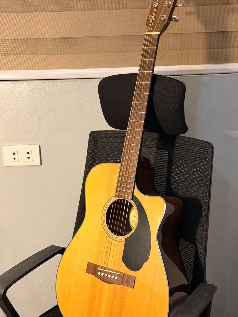 Fender Acoustic Guitar with Fishman Preamp (Category: Musical Instruments) located in Manila. Submitted by truestar-9eec (Listing ID 1471004805, Image 2). Description: - Brand/Model: Fender Acoustic-Electric Guitar CC-60SCE - Finish: Natural wood finish with black pickguard - Body Shape: Venetian cutaway for easy upper fret access - Electronics: Built-in Fishman preamp system with onboard tuner, volume, bass, and treble controls - Hardware: Gold 