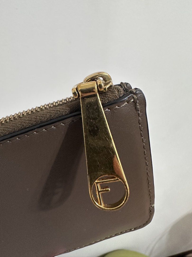 Fendi FF Embossed Leather Key Case Pouch / Coin Purse (Category: Wallets & Card holders) located in Malabon City. Submitted by seseche (Listing ID 1471052234, Image 3). Description: Fendi FF Embossed Leather Key Case Pouch / Coin Purse.