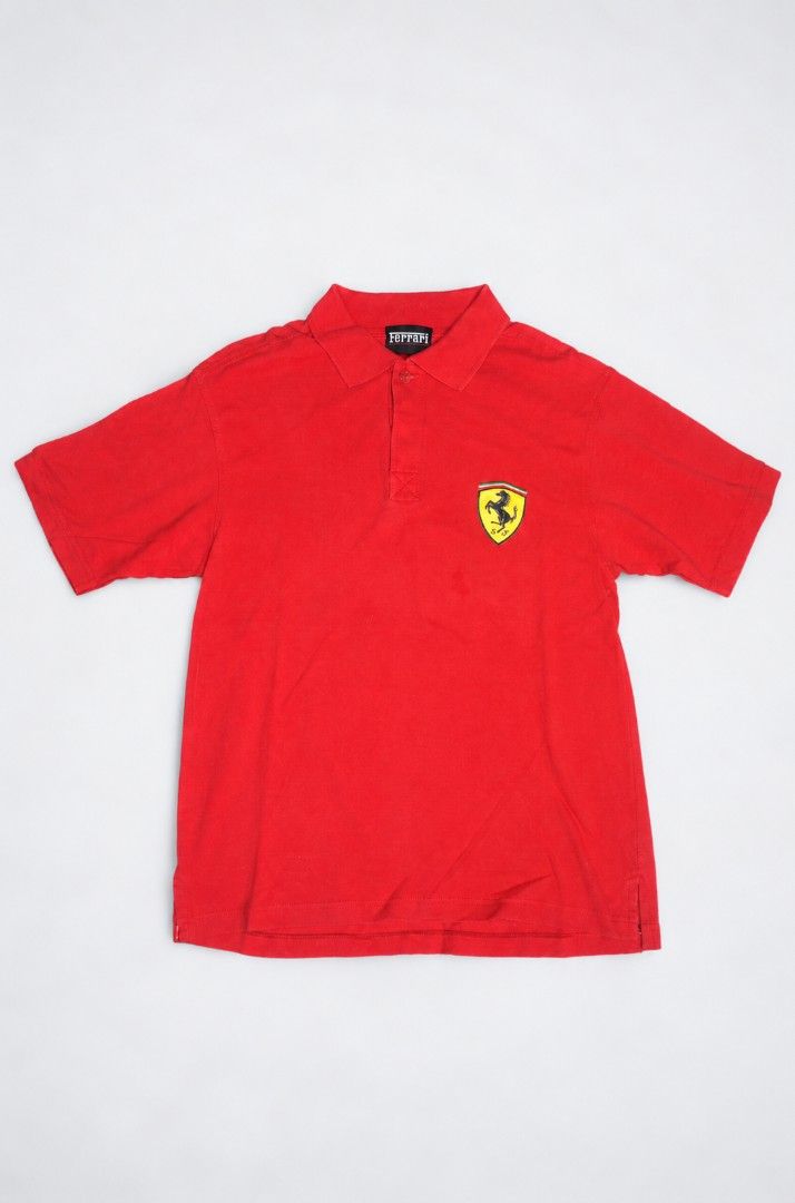 Ferrari Red Polo Shirt (Category: Tshirts & Polo Shirts ) located in Manila. Submitted by yvl.mnl (Listing ID 1470974184, Image 1). Description: 18x26.5 minimal pin hole (unoticable) @yvl.mnl on IG.