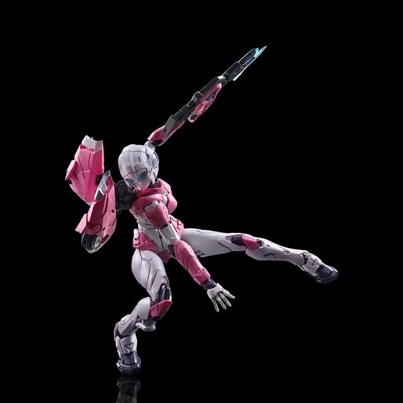 FLAME TOYS Furai Action - Arcee (Category: Figurines & Statues) located in Manila. Submitted by mauchan00000303 (Listing ID 1470979173, Image 3). Description: - Articulated pink and white mecha anime action figure - Highly poseable joints for dynamic action poses - Detailed armor design with shoulder wheel accents - Includes modular display base with support arm - Comes with interchangeable hands, twin pink energy blades, and rifle accessory.