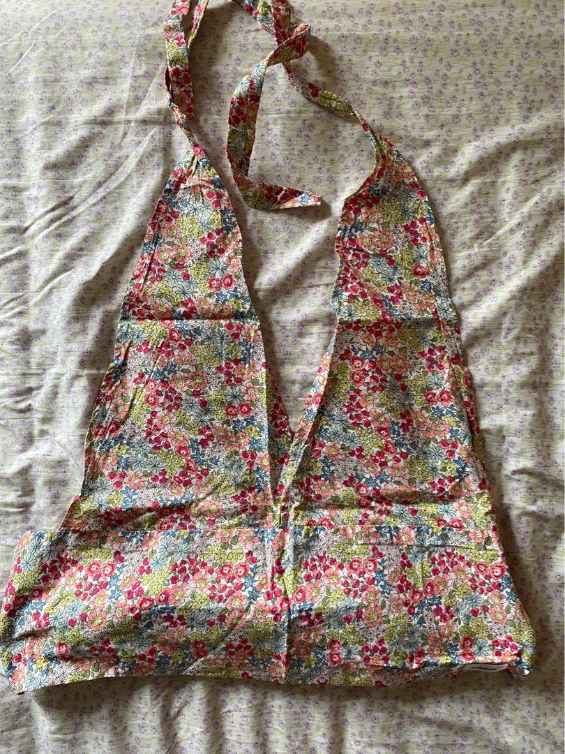 Floral Multi way Halter Top Backless Tie-Back Shirt (Category: Sleeveless) located in Quezon City. Submitted by damclothings.ph (Listing ID 1470948060, Image 1). Description: - Design: Vibrant multicolor floral print with a trendy halter neck - Fit: Adjustable tie straps at the back for a custom fit - Fabric: Lightweight and breathable, ideal for hot summer days - Styling: Easy to match with denim shorts, jeans, or skirts MOP: Maya Gcash Bank tra