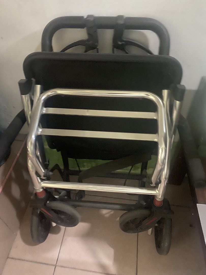 Foldable wheelchair (Category: Wheelchairs) located in Taguig. Submitted by msvita (Listing ID 1470948854, Image 2). Description: - Color: Black and Blue - Ultra- compact folding mechanism; very convenient for travelling - Built-in seat and backrest for resting anytime - Caregiver controlled hand brakes with easy stopping and locking functions - Comfortable padded armrests - Durable metal frame that folds compactly for easy storage and car travel