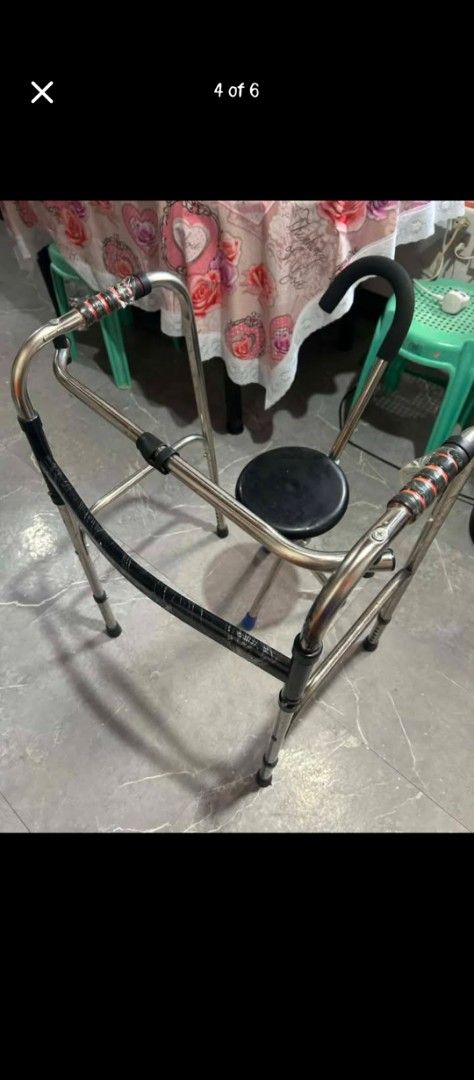 folding wheelchair and mobility walker set (Category: Wheelchairs) located in Bacoor. Submitted by hakob123 (Listing ID 1470975846, Image 3). Description: - Color: Blue and black - Wheelchair features: Folding design, footrests, and safety strap - Walking frame: Standard metal frame with comfortable hand grips - Storage & Transport: Both items are fully collapsible for easy storage - Material: Sturdy metal frames with durable fabric seats - Ideal