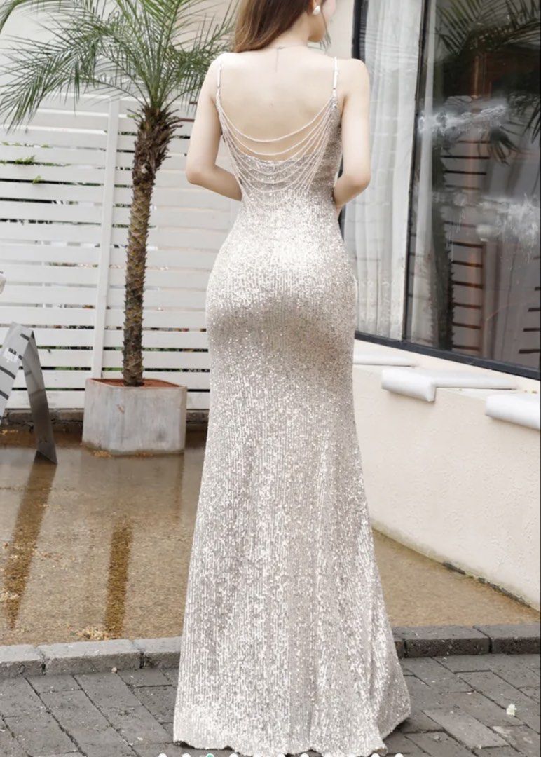 FOR RENT: Silver Gown with Open Back and Front Slit (Category: Evening dresses & gowns) located in Quezon City. Submitted by barbysandy (Listing ID 1471033503, Image 1). Description: ✨ Silver Gown for Rent ✨ 💰 Rental Fee: ₱799 for 3 days 🔒 Security Deposit Required 📍 Meet-up / Pickup Location: Ever Gotesco Mall, Commonwealth or Starbucks beside Ever Gotesco Mall 🚚 Pickup & Delivery: Commonwealth Avenue, Batasan Hills, Quezon City. 📩 PM me fo