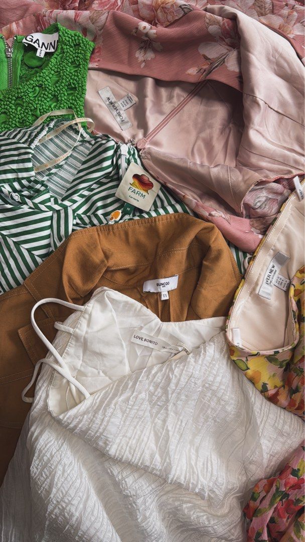 FOR SALE SOON (DECLUTTERING) (Category: Sets or Coordinates) located in Quezon City. Submitted by homefornewclothes_03 (Listing ID 1471018419, Image 1). Description: - Curated women's apparel bundle from popular brands: Ganni, Farm Rio, Forever New, Suncoo, and Love Bonito - Includes a great mix of versatile tops and dresses for an instant wardrobe refresh - Piece highlights include a bright green textured top, a chic striped dress, a versatile b