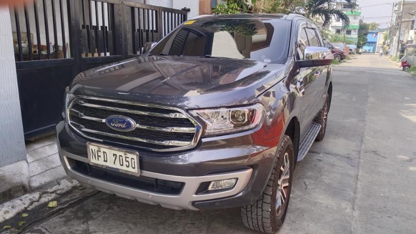 Ford Everest (Category: Lot) located in Quezon City. Submitted by donjonchua07 (Listing ID 1464970715, Image 2). Description: 🩶 Meteor Gray (4x2) ​💰 PRICE: ₱800,000 ​✨ MILEAGE: 24,200+ KM ONLY ⚙️ Automatic Transmission ⛽ Diesel ✨ Fresh & Premium SUV • Well-Maintained ​FEATURES: • Power Tailgate (Power Liftgate) • Power Folding 3rd Row Seats • Brand New Michelin Tires • Premium Leather Interior • Power Adjustable Driver & Front Passenger Seats •