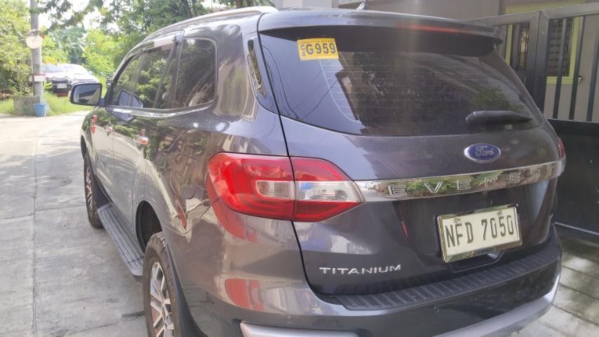 Ford Everest (Category: Lot) located in Quezon City. Submitted by donjonchua07 (Listing ID 1464970715, Image 3). Description: 🩶 Meteor Gray (4x2) ​💰 PRICE: ₱800,000 ​✨ MILEAGE: 24,200+ KM ONLY ⚙️ Automatic Transmission ⛽ Diesel ✨ Fresh & Premium SUV • Well-Maintained ​FEATURES: • Power Tailgate (Power Liftgate) • Power Folding 3rd Row Seats • Brand New Michelin Tires • Premium Leather Interior • Power Adjustable Driver & Front Passenger Seats •