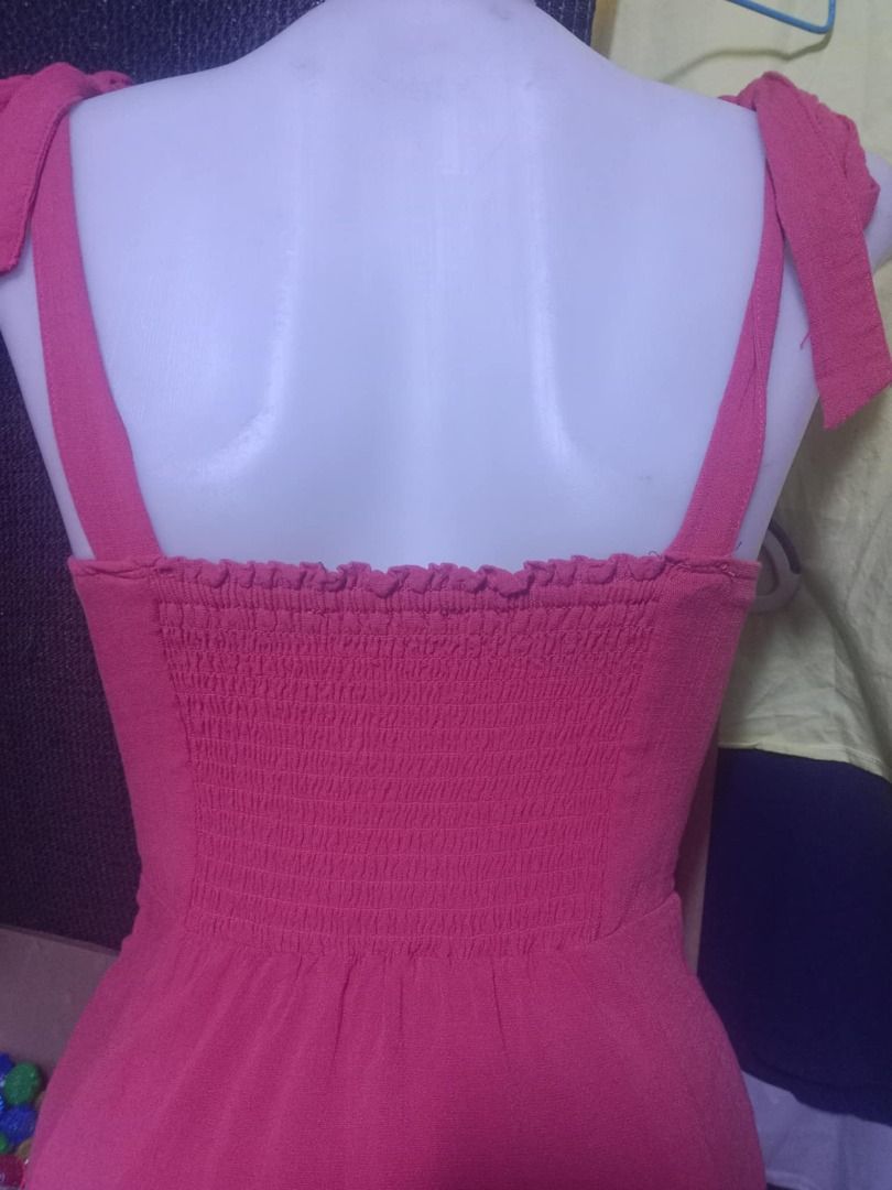Forever 21 Pink Tie Strap Dress (Category: Dresses) located in Quezon City. Submitted by honeyonline.ph (Listing ID 1471047492, Image 2). Description: - Brand: Forever 21 - Size: Small (S) - Color: Pink - Neckline: Deep V-neck with gathered bust - Straps: Adjustable tie shoulder straps - Fit: Stretchy smocked back panel for comfort - Design: Flared skirt, lightweight fabric.