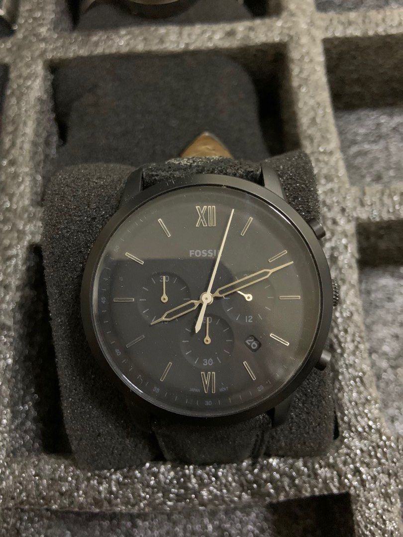 Fossil Black Chronograph Watch (Category: Men's Watches) located in Manila. Submitted by relokado (Listing ID 1470861720, Image 1). Description: - Authentic Fossil chronograph watch in a sleek black finish - Dark dial accented with elegant gold-tone hands - Roman numerals featured at the 6 and 12 o'clock positions - Functional design includes three subdials and a convenient date window near 4 o'clock - Comes resting on a foam watch pillow for saf