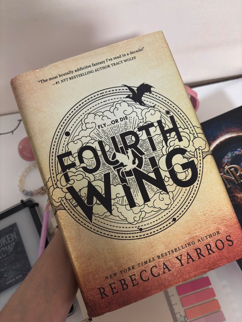 Fourth Wing Special Edition Hardcover (Category: Storybooks) located in Imus. Submitted by thebookafterromantasy (Listing ID 1471030973, Image 2). Description: 📖 FOURTH WING by Rebecca Yarros Format: Hardcover Condition: Good (With Annotations) Reading Status: Read / Annotated IMPORTANT: Pages from 1 and 13 have been underlined in red and blue ink. ✨ Book Condition: Personally owned and kept on bookshelf Hardcover with dust jacket Cover and spin