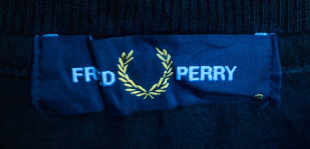 Fred Perry Black Embroidered Logo T-Shirt (Category: Tshirts & Polo Shirts ) located in Digos. Submitted by thrifthed.ph (Listing ID 1471021693, Image 2). Description: - Brand: Fred Perry - Color: Solid Black - Size: Standard Fit -med -dimes:20/28 -like new -no issue -cl:9.8:10 -need wash -authentic -complete tags -solid condi -solid colorate -authentic -suitable for picky buyer -no return no exchange - Material: 100% Cotton (Machine washable) - 