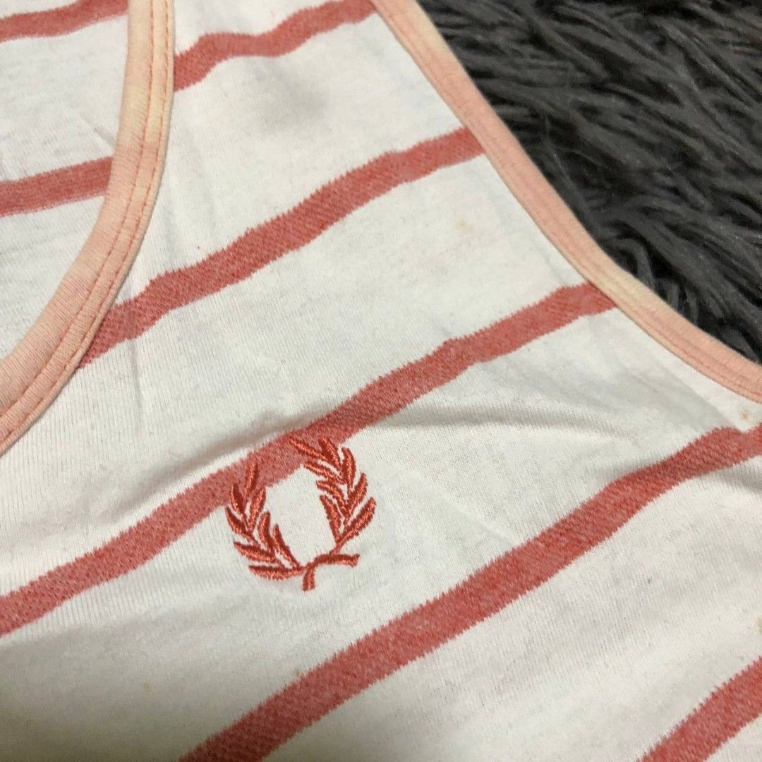 Fred Perry Sleeveless Shirt (Category: Activewear) located in Camiling. Submitted by thriftscape2024 (Listing ID 1470979766, Image 2). Description: Excellent Condition Color rate: 9/10 Issue: stain Dimes: W17xL26.