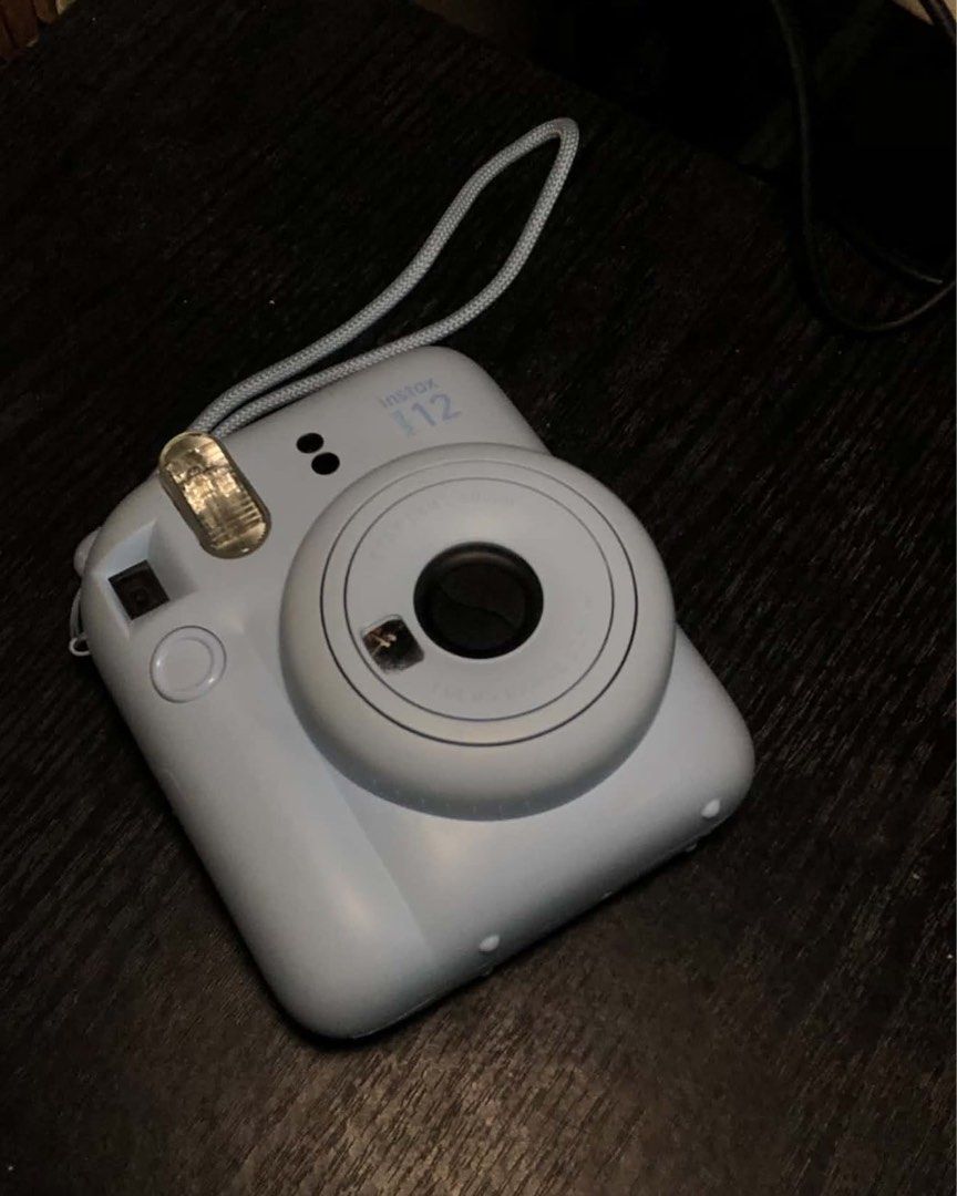 Fujifilm Instax Mini 12 (Category: Cameras) located in Manila. Submitted by fiercecrystal_b16f08 (Listing ID 1470937050, Image 1). Description: FOR SALE: Fujifilm Instax Mini 12 🤍 Inclusions: - 2 remaining shots of film - Original box Condition: - Less than a year since purchase - Rarely used and still in good condition - No issues, everything works well! 💸 Price: Negotiable 📍 Meet-up only: Manila: Intramuros Quezon City: Fisher Mall.