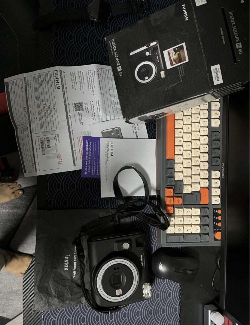 Fujifilm Instax Square SQ40 Camera (Category: Cameras) located in Dumaguete. Submitted by sellie06 (Listing ID 1471054979, Image 2). Description: ✅ Condition: Very Good / Mint Condition ✅ Complete with box, manuals, and strap ✅ Fully functional, no issues 💰 Original Price: ₱9,000 🔥 Selling Price: ₱7,500 only 📌 Film not included 📌 No extra batteries included.