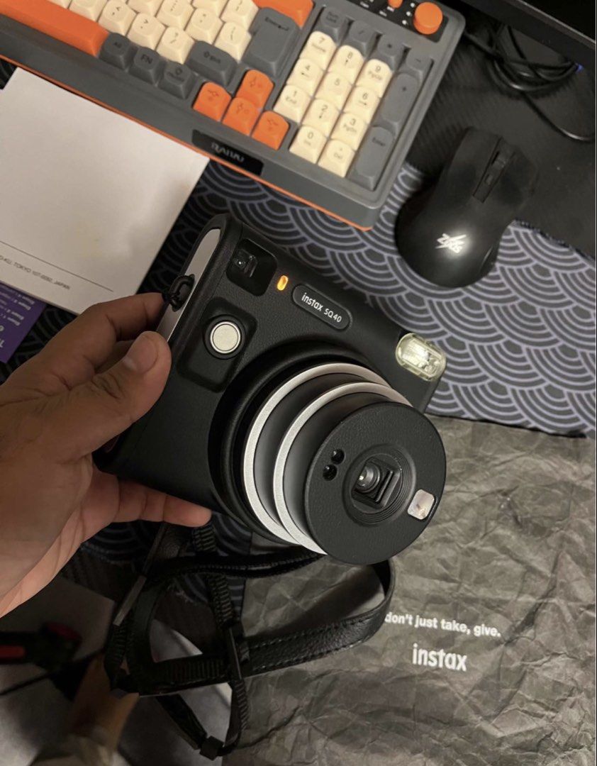 Fujifilm Instax Square SQ40 Camera (Category: Cameras) located in Dumaguete. Submitted by sellie06 (Listing ID 1471054979, Image 3). Description: ✅ Condition: Very Good / Mint Condition ✅ Complete with box, manuals, and strap ✅ Fully functional, no issues 💰 Original Price: ₱9,000 🔥 Selling Price: ₱7,500 only 📌 Film not included 📌 No extra batteries included.