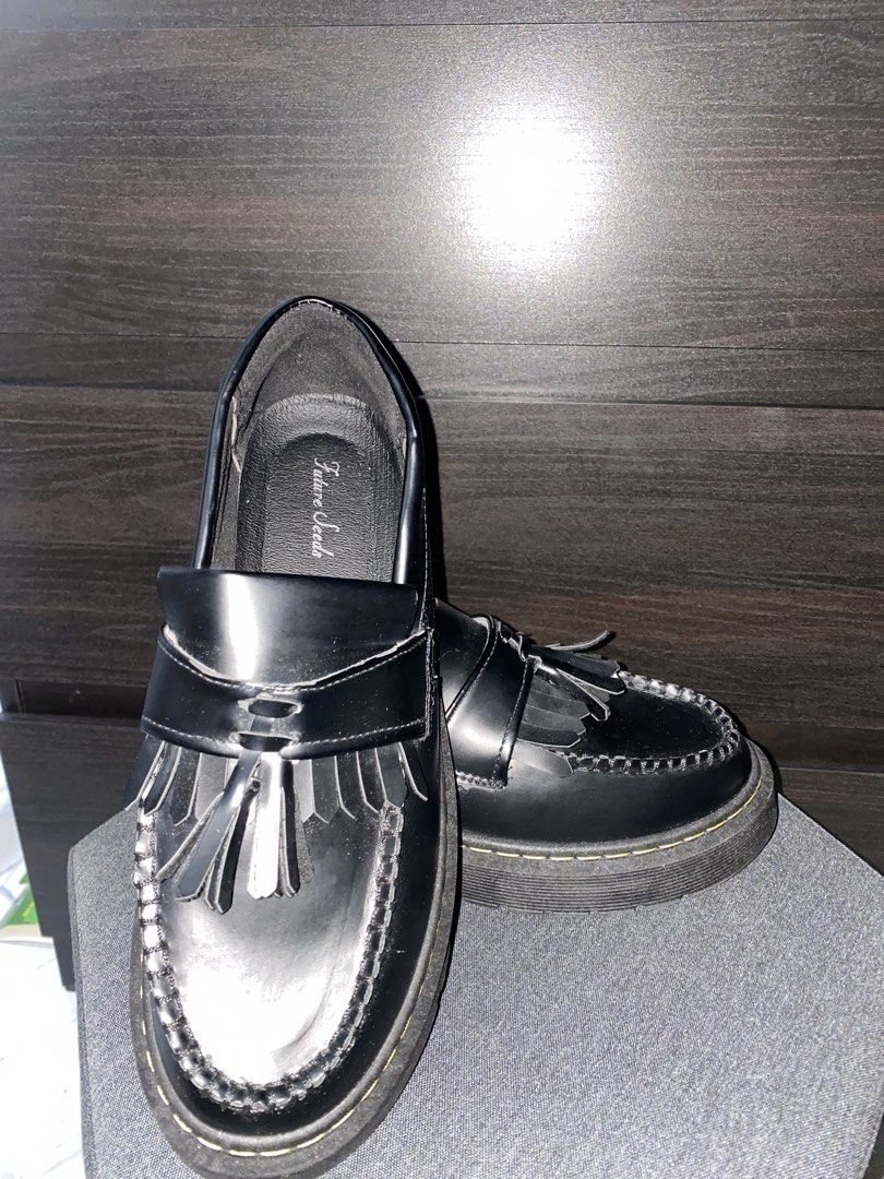 Future Seeds Black Tassel Platform Loafers Size 42 (Category: Dress Shoes) located in Santa Rosa. Submitted by cortezedwin15 (Listing ID 1471052542, Image 3). Description: - Brand: Future Seeds - Style: Black platform loafers with tassel and fringe detail - Size: 42 (printed on outsole) - Features: Yellow contrast stitching and slip-on design - Soles: Thick lug soles with minimal wear - Condition: Great for everyday styling NEVER BEEN WORN BEST F