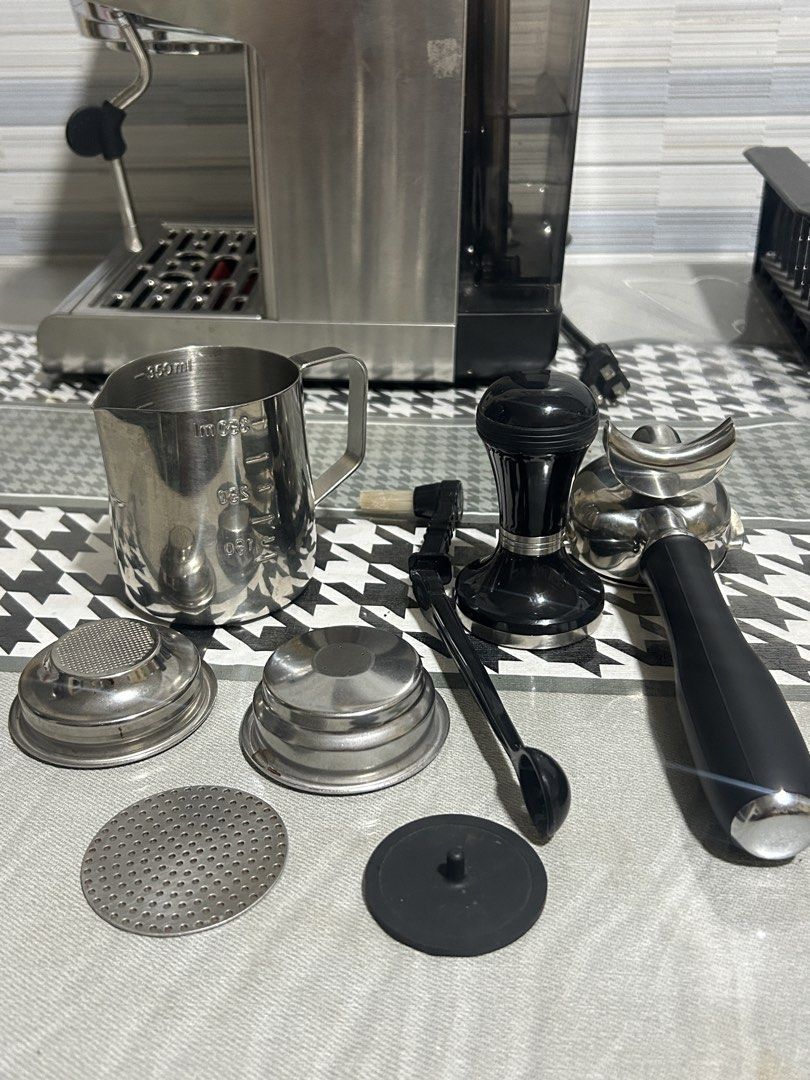 Gemilai 3003B (Category: Coffee Machines & Makers) located in Taguig. Submitted by bjsbo (Listing ID 1471067443, Image 2). Description: FOR SALE GEMILAI 3003b Home used for about 2 months only. Nagupgrade lang to 3007z Inclusions: - 58mm portafilter - Milk pitcher - Complete set of baskets - Tamper - 58mm puck screen - Cleaning brush Price: 9,000 Location: Taguig Pickup or Lalamove only .