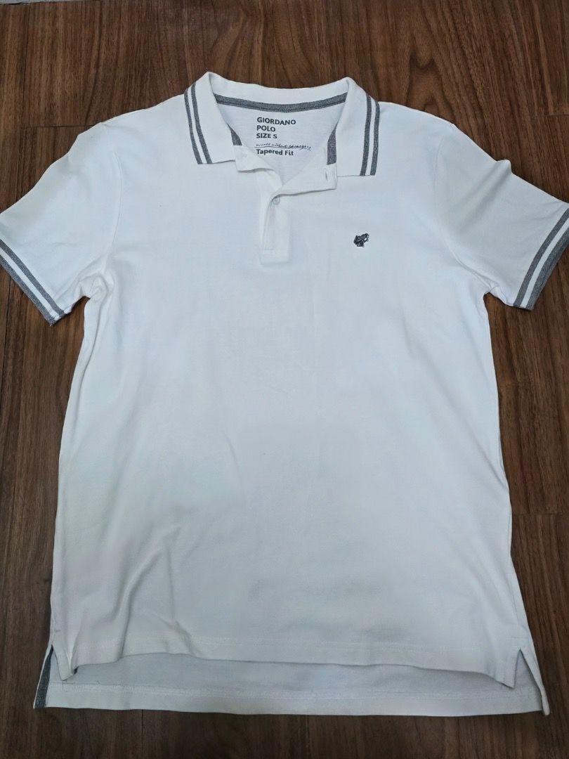 Giordano White Polo Shirt Size S (Category: Tshirts & Polo Shirts ) located in Manila. Submitted by zmpnsln (Listing ID 1471075244, Image 1). Description: Giordano White Tapered Fit Polo Shirt – Men's S Asking Price: ₱349 (Negotiable) - Brand: Giordano - Size: Men's Small (S) - Color: White with Gray Details - Style: Classic Short-Sleeve Polo Shirt - Fit: Tapered Fit - Collar: Gray Double-Striped Polo Collar - Sleeves: Short Sleeves with Striped 