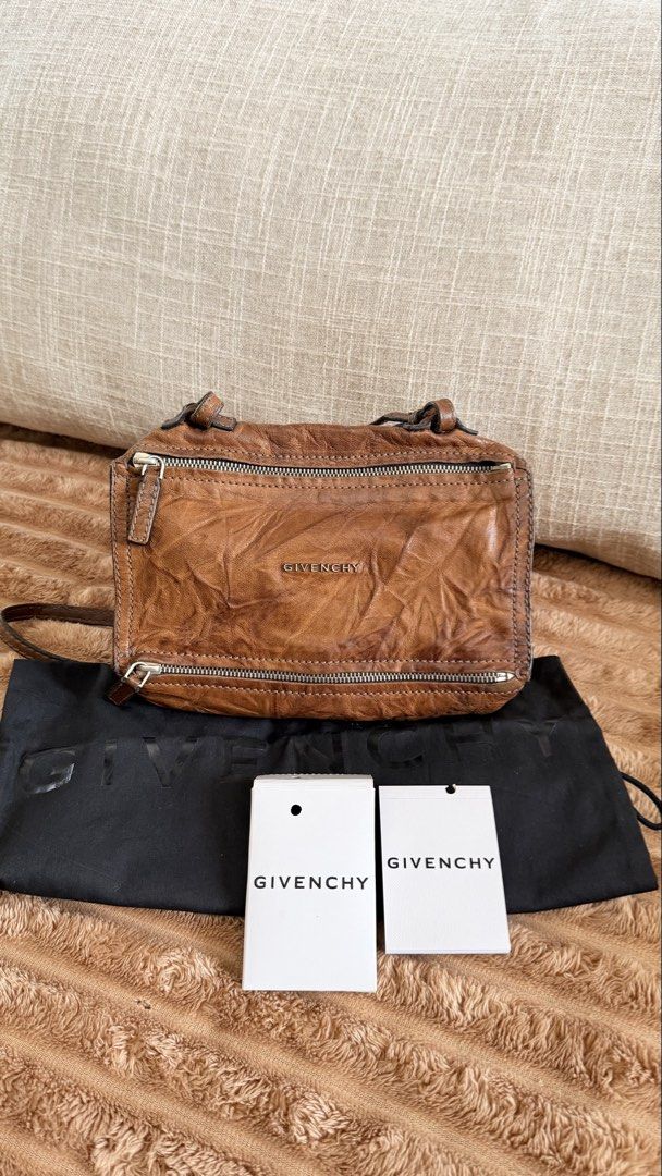 Givenchy Brown Leather Crossbody Bag (Category: Luxury Bags & Wallets) located in Rizal. Submitted by kwisee (Listing ID 1470941481, Image 1). Description: Givenchy Pandora with original dust bag and booklet Brown crinkled sheepskin leather Silver hardware Condition: Rank AB Has minor and negligible rubs on corners Photos of signs of use will be provided upon request..