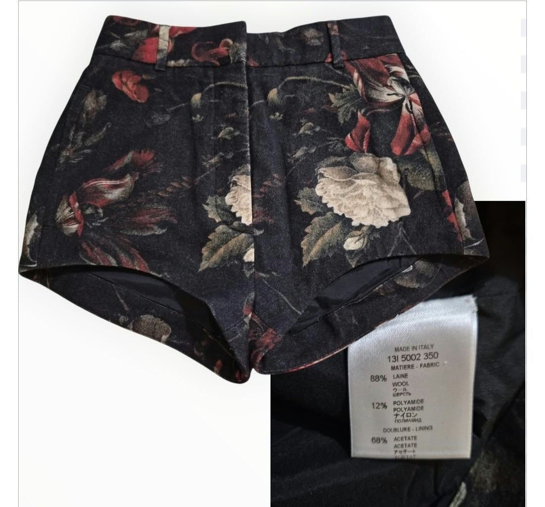 GIVENCHY Floral Print Wool High Rise Shorts Size 34 (Category: Shorts) located in Paranaque City. Submitted by calm_youngstore7 (Listing ID 1471014372, Image 1). Description: 80% OFF RETAIL! - Brand: Givenchy Paris - Style: High-rise wool shorts with belt loops and back welt pockets - Color/Pattern: Dark black base with a vibrant red and white floral print - Size: 34 - Material: 88% wool, 12% polyamide; Acetate lining - Origin: Made in Italy - Co