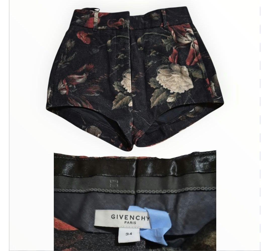 GIVENCHY Floral Print Wool High Rise Shorts Size 34 (Category: Shorts) located in Paranaque City. Submitted by calm_youngstore7 (Listing ID 1471014372, Image 3). Description: 80% OFF RETAIL! - Brand: Givenchy Paris - Style: High-rise wool shorts with belt loops and back welt pockets - Color/Pattern: Dark black base with a vibrant red and white floral print - Size: 34 - Material: 88% wool, 12% polyamide; Acetate lining - Origin: Made in Italy - Co