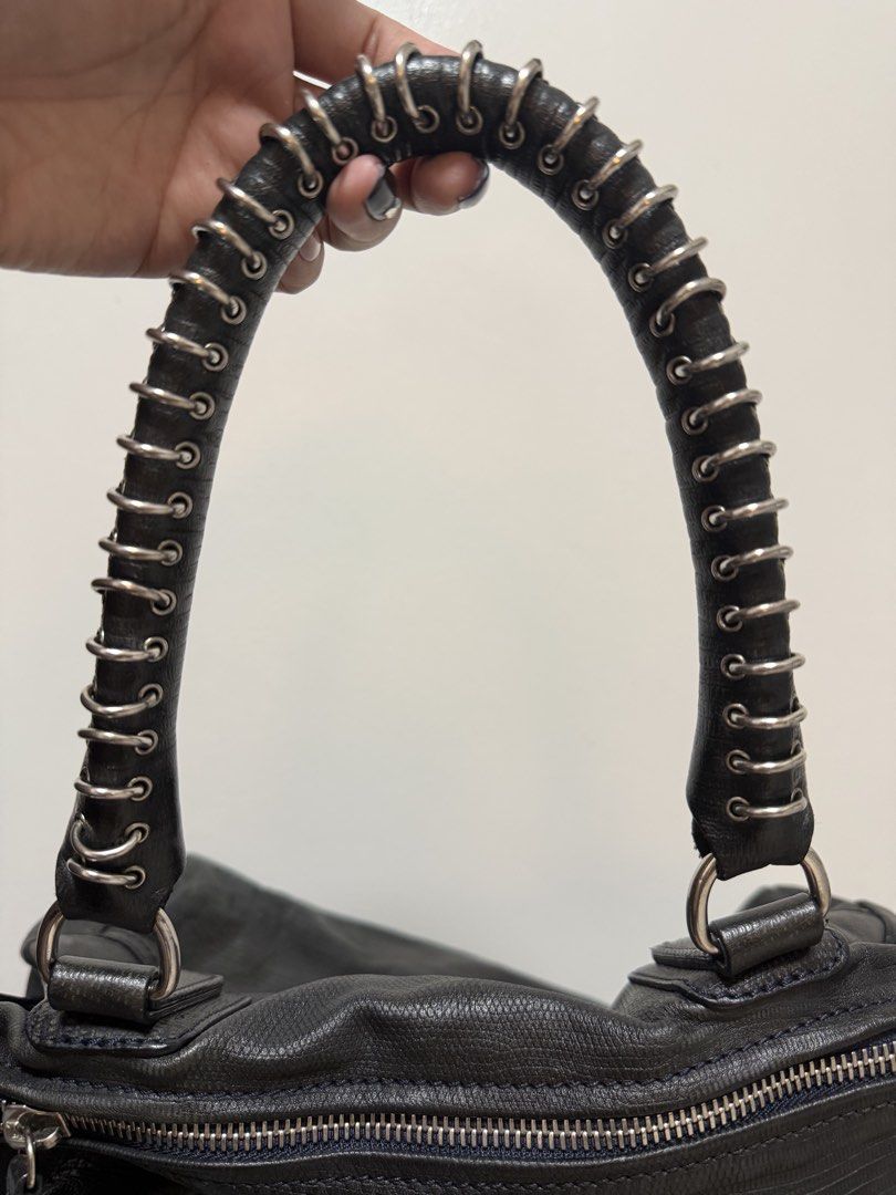Givenchy Pandora Lizard (rare) (Category: Luxury Bags & Wallets) located in Rizal. Submitted by maccluxfinds (Listing ID 1471034935, Image 2). Description: - Givenchy Pandora (large, rare) - In excellent preloved condition,lizard leather, unique handle with metal rings - With long strap and card - Fresh from the bag spa - No foul smell, very minimal signs of usage, no leather scuffs or open pipes, no handle glazing issue - Bag only with replaceme